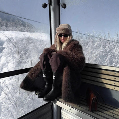 Manteau mi-long en fausse fourrure douce